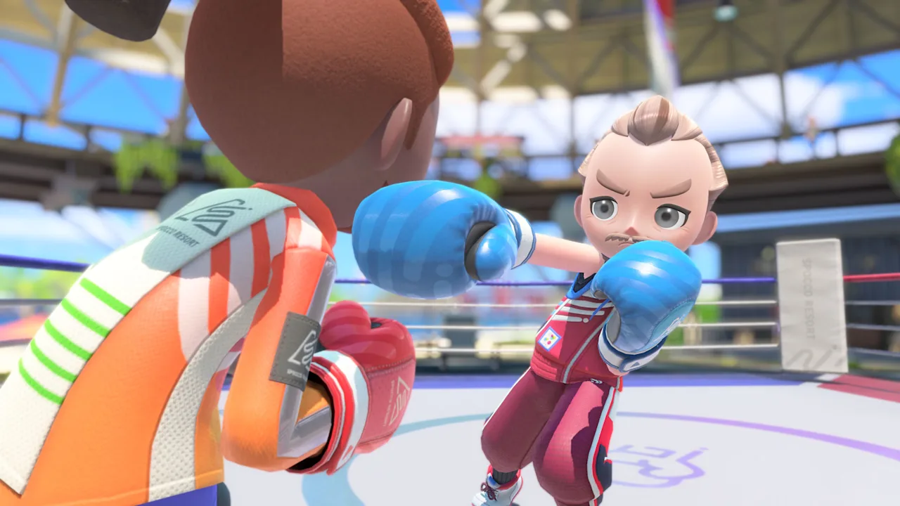 Two Sportsmates trading punches in a Boxing ring