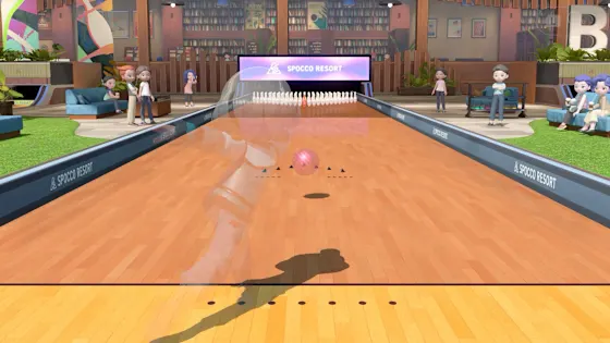 Bowling ball rolling down the lane in the bowling alley