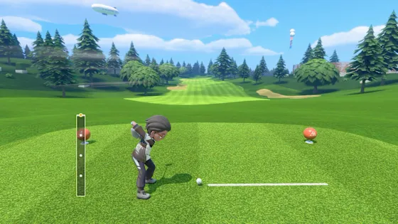 Golfer lining up a shot on a green fairway