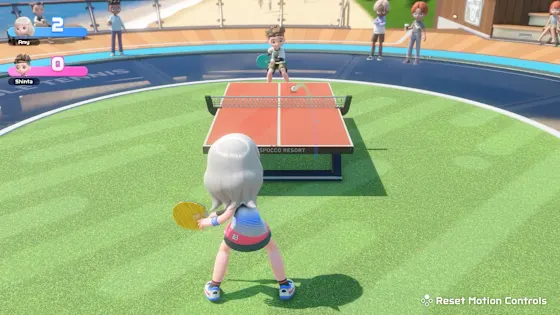 Table Tennis rally on an outdoor table